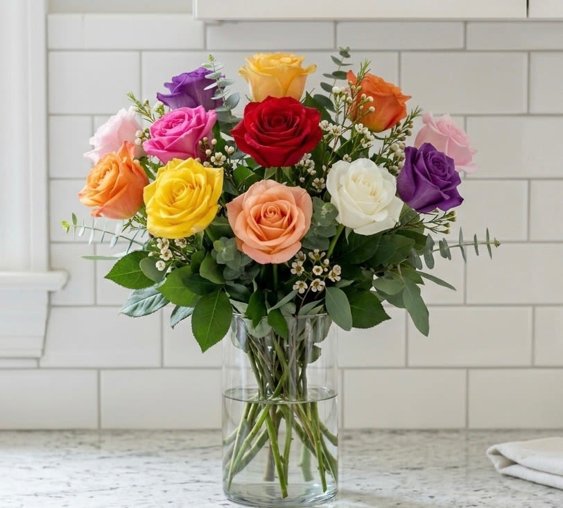 1 Dozen Multicolored Roses - This cheerful rose bouquet showcases a variety of colors. 
