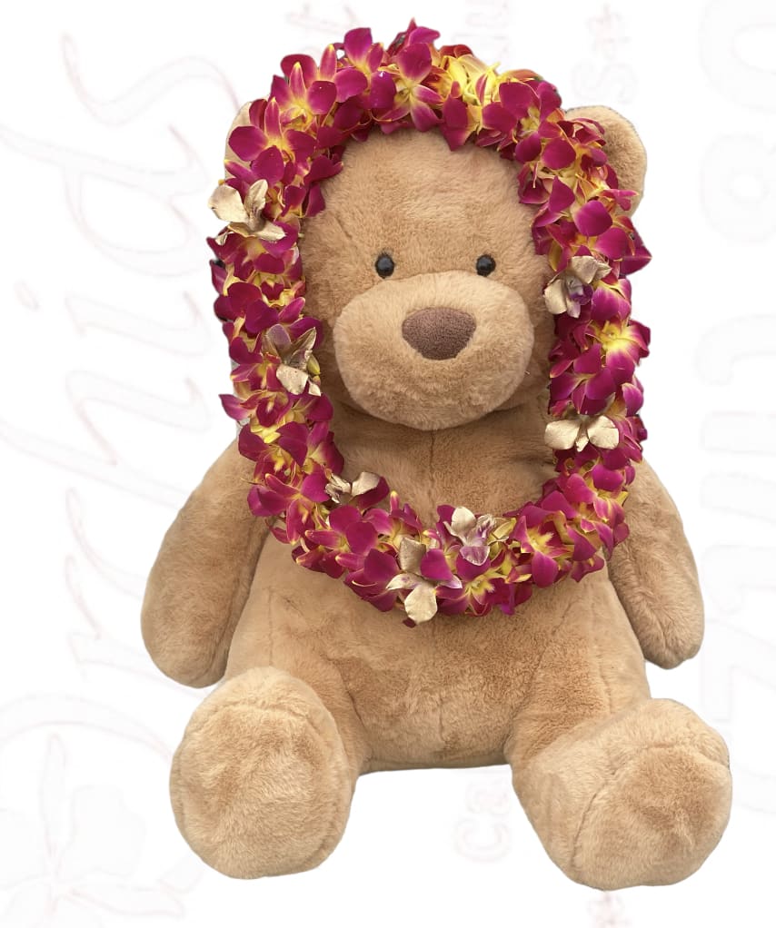 Teddy bear wearing a magenta flower lei