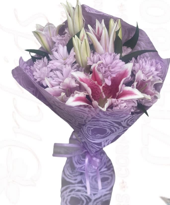 Lavender bouquet with lilies and chrysanthemums wrapped in purple paper