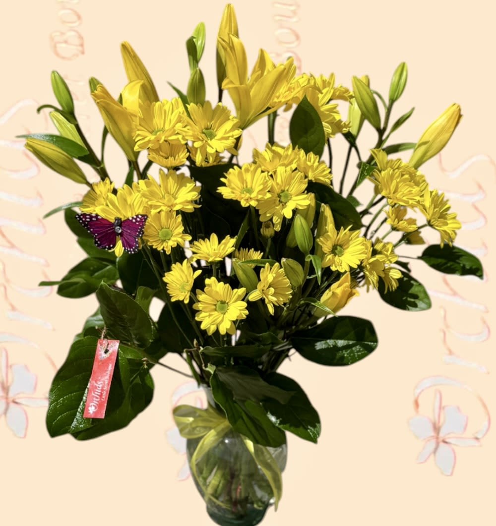 Sunshine Lillies Bouquet  - Arrangement measures approximately 15"H Send spring Fresh sunny lilies bouquet  the perfect way to show your appreciation to the sunshine in your life! These bouquets are a great option for Mother's Day, to say I miss you, get well soon, or thank you!