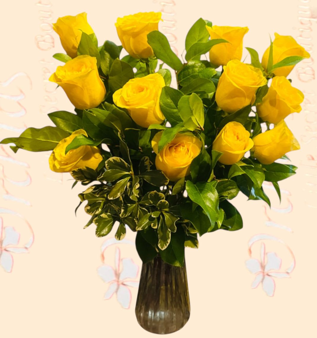 Yellow roses arranged in a dark glass vase