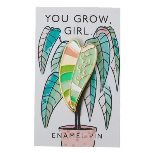 Enamel pin on a card with a potted plant illustration and the words "You grow, girl."