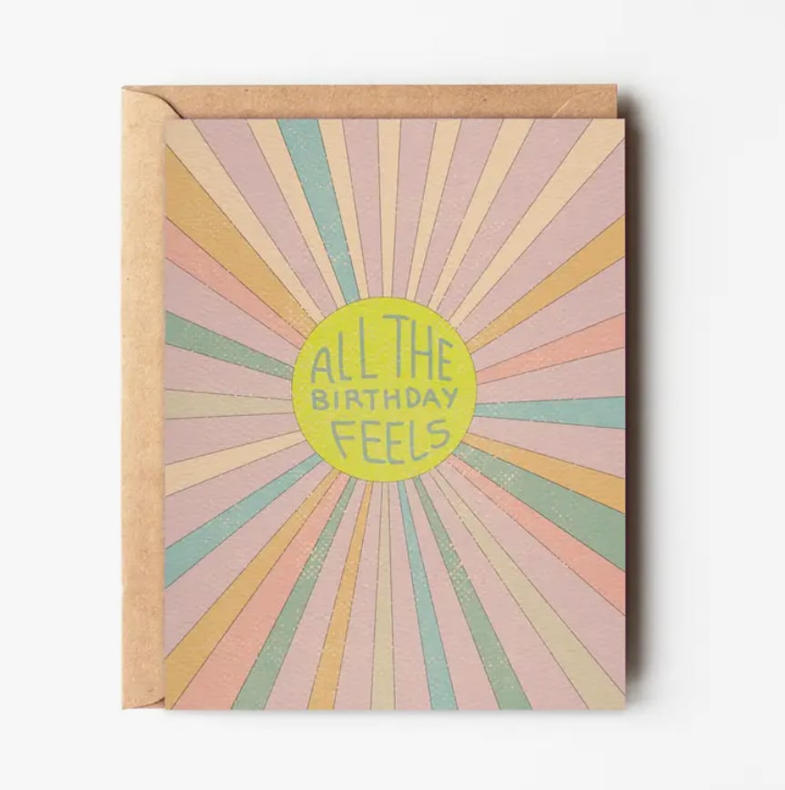 Birthday card with pastel sunburst design and "All the Birthday Feels" text