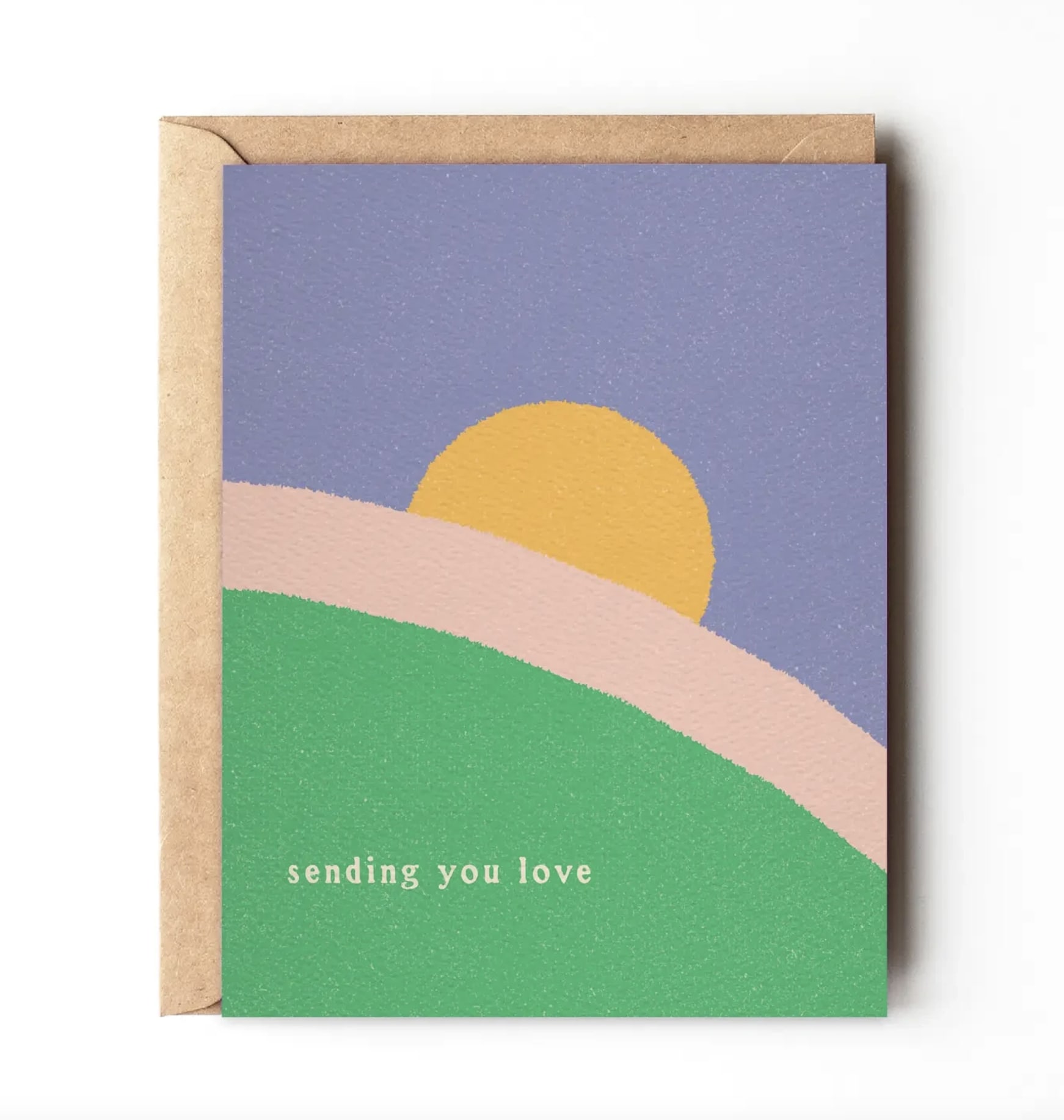 Greeting card with a pastel sunset design and the words "sending you love"