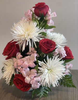 Red roses and white spider mums with pink filler flowers