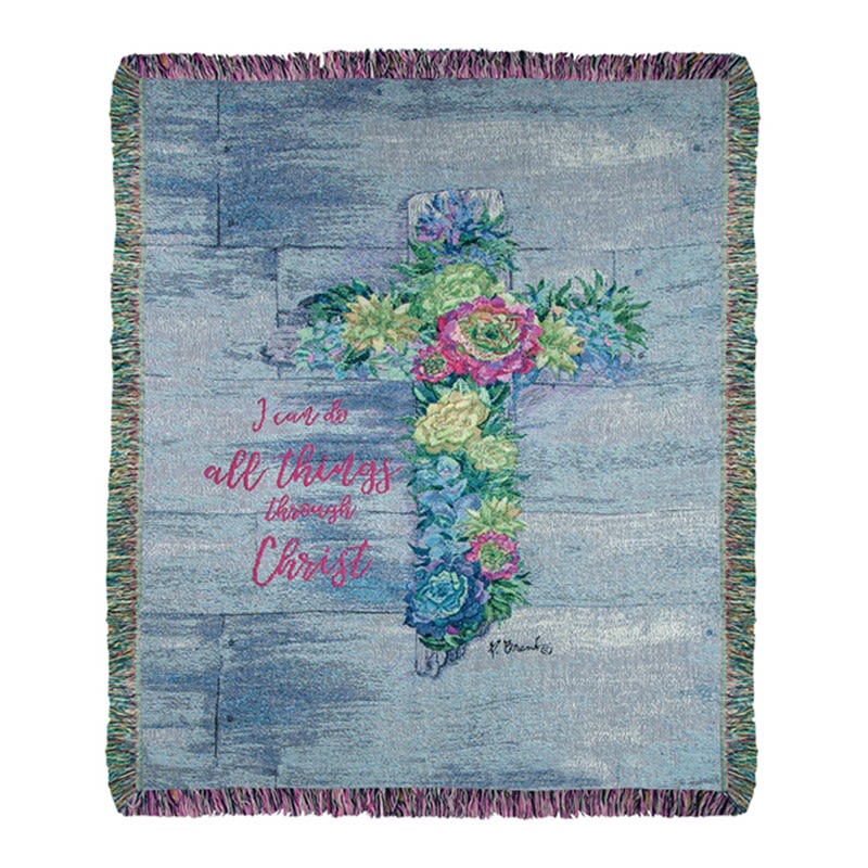 Religious throw blanket with floral cross design and inspirational text on a blue wood-look background