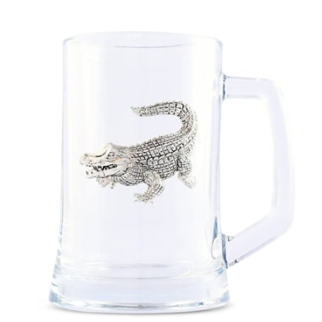 Alligator Glass Mug by Arthur Court - Hand-crafted with legendary attention to detail, this Arthur Court alligator glass mug brings a sophisticated "Gator" flair to any setting. From the swamp to the sideboard, it is designed to be both a functional drinkware piece and a conversation-starting work of art.  This versatile pint glass is the ultimate gift for any occasion, serving as a prestigious wedding present, a spirited UF graduation keepsake, or a stunning accent for your next party. Crafted with signature Arthur Court quality and detailed metalwork, it ensures a premium entertaining experience that remains a cherished heirloom long after the celebration ends.