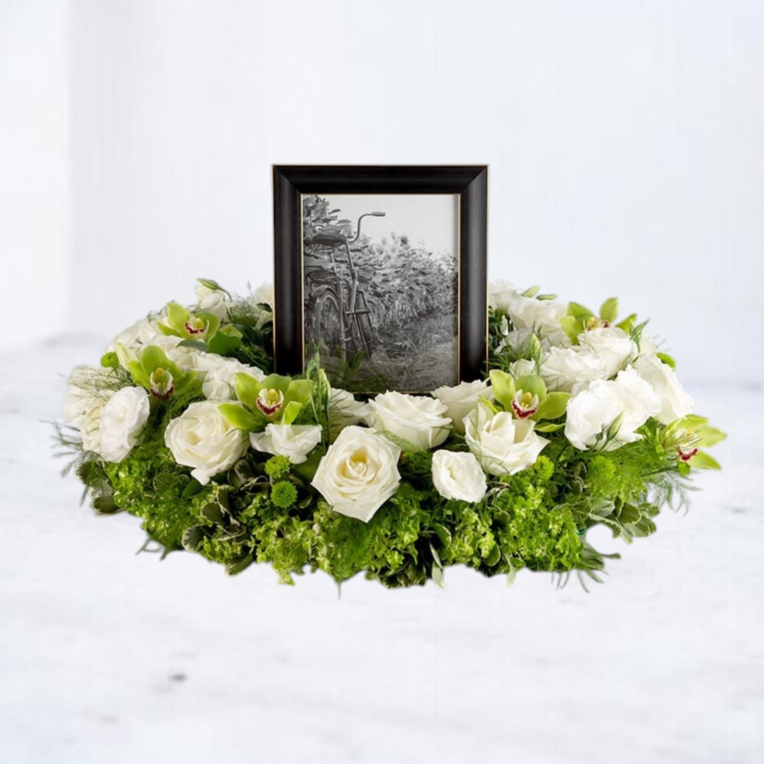 Beautiful Memories - A beautiful tribute piece and a way to frame a wonderful memory. Honor the memories by surrounding them in blooms.  Frame not included. 