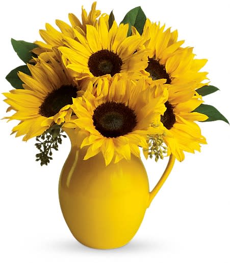 Sunny Day Pitcher of Sunflowers - Pour on the fun by sending this dazzling bouquet of summer's brightest blooms! Great if you're invited to a pool party, BBQ or just want to brighten up someone's day.  Stunning sunflowers, salal and seeded eucalyptus are beautifully arranged in a brilliant yellow ceramic pitcher. This gift will be serving up fun and sun for years to come. Approximately 13" W x 15 1/2" H
