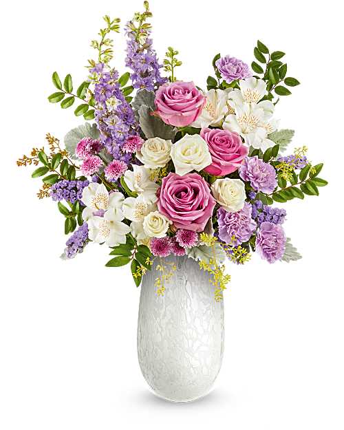 Pink and white roses with purple flowers in a white vase