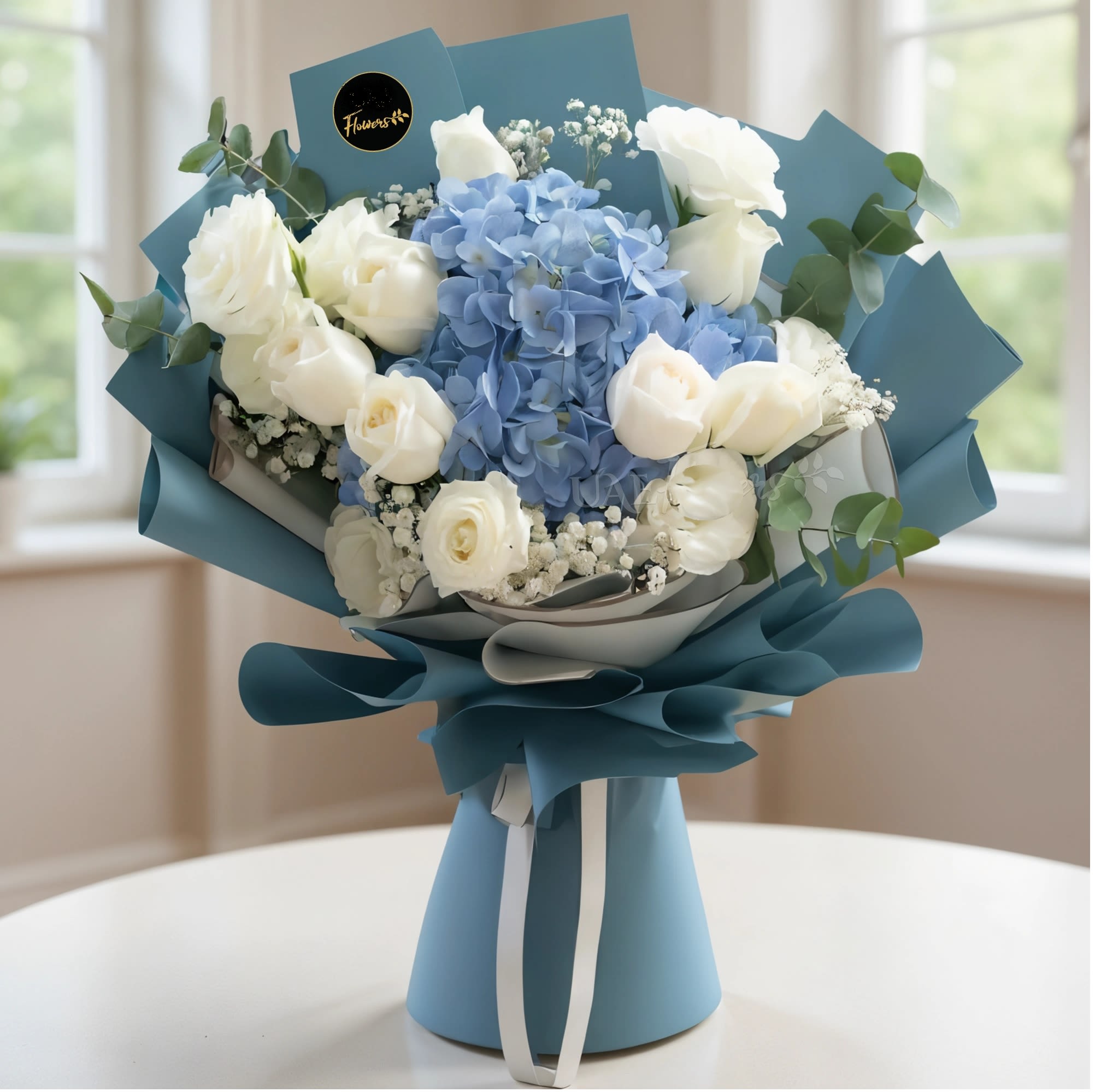Blue and white bouquet of roses and hydrangeas wrapped in teal paper