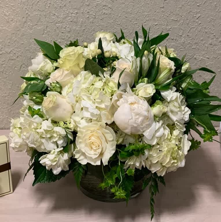 All My Love (DL) - Show them how much you truly care with this exquisite, plush and modern arrangement. All My Love comes expertly crafted with White Hydrangeas, Roses, Peonies and more.