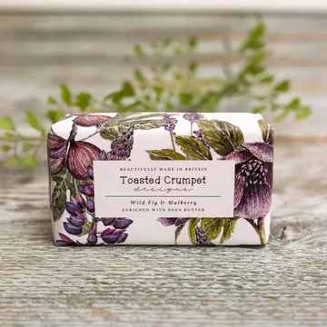 Wrapped soap bar with a floral print label