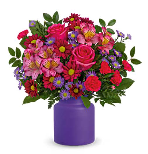 You're Brilliant - Brilliant as can be, this bold bouquet of hot pink roses in a frosted glass jar celebrates any occasion with style! This arrangement includes hot pink roses, pink alstroemeria, hot pink miniature carnations, purple daisy spray chrysanthemums, large purple monte cassino asters, leatherleaf fern, lemon leaf and huckleberry. Delivered in Teleflora's Savannah Jar.