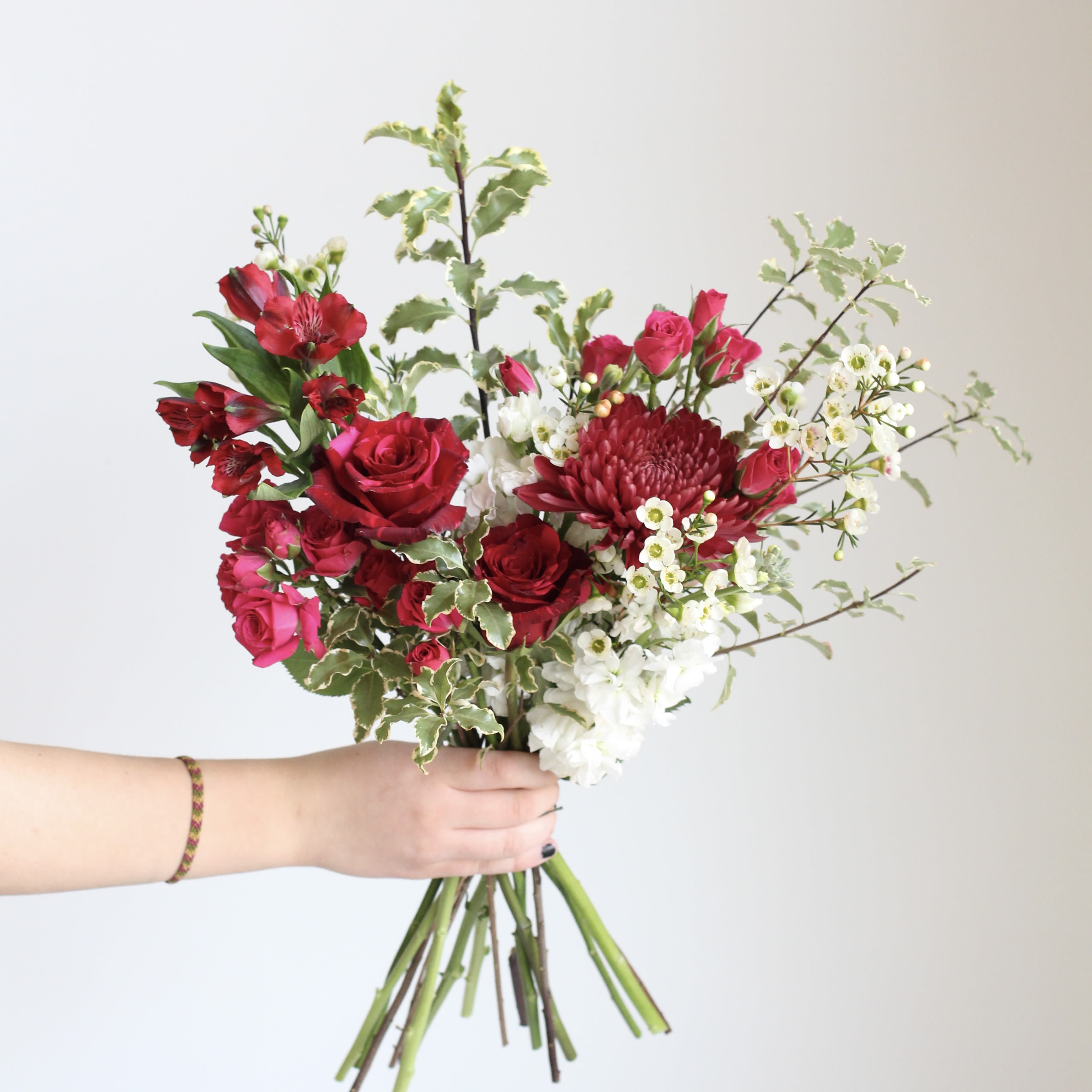 Designer's Choice Bouquet -Everyday - Designer's Choice Everyday Bouquet, Grab n Go. In Studio only. These small bouquets are thoughtfully arranged with fresh, seasonal blooms chosen by our designers. Perfect for a quick gift or a little something just because. Pricing includes a wet wrap, paper wrap, and ribbon.