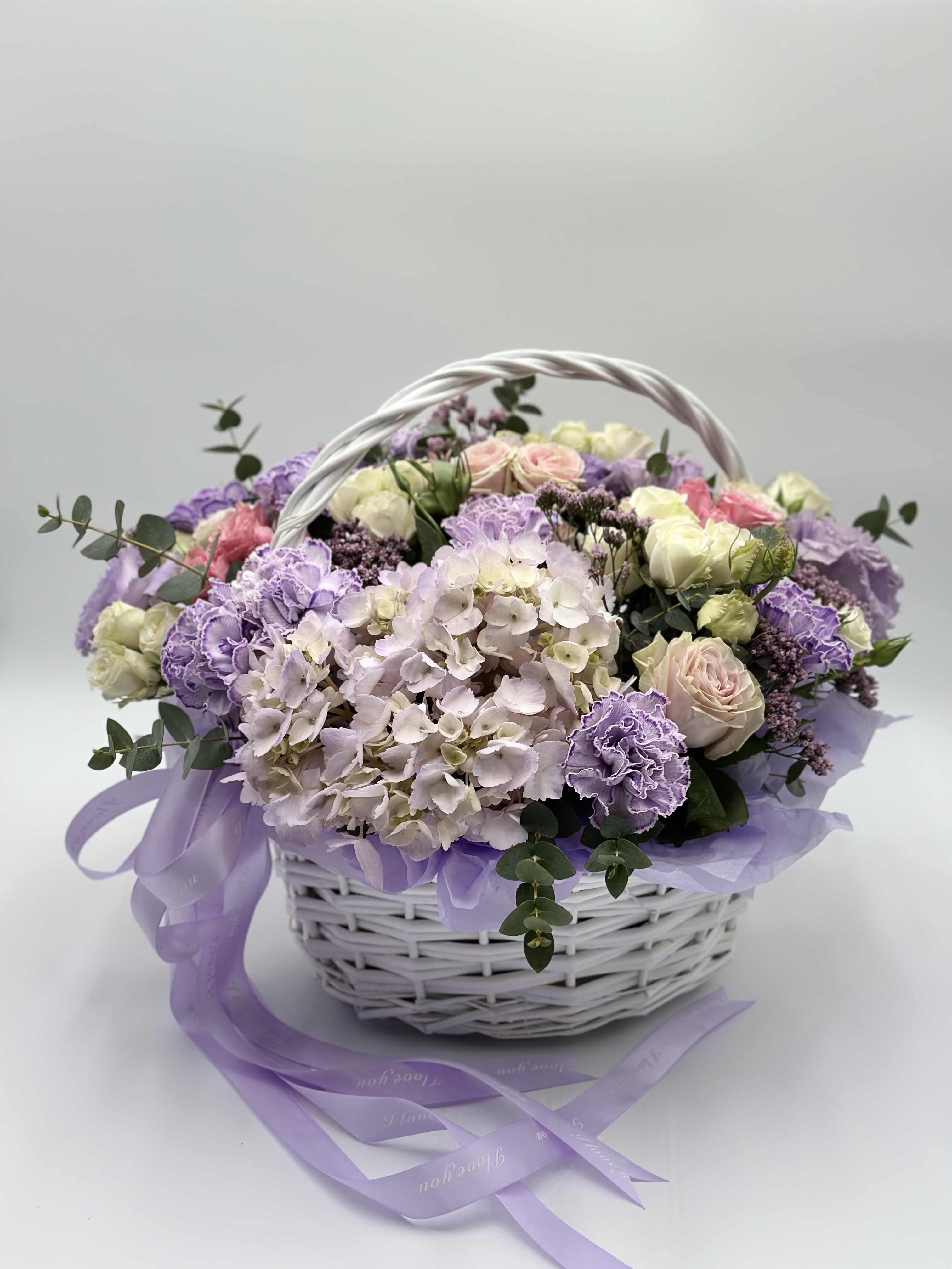 Tender Moment - Like a spring morning — light, calm, and touching. This basket is gathered in soft lilac and lavender tones, with a hint of dreamy charm. Each flower whispers gently of care, warmth, and sincerity.  A perfect gift to share peace, inspiration, and a little piece of heartfelt light.