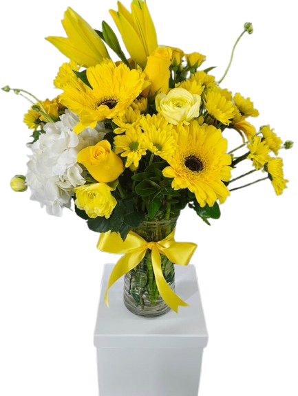 Sunshine Arrangement  - A beautiful yellow arrangement that includes many various flowers.