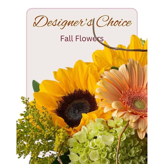 Sunflowers and a peach gerbera daisy with green hydrangea