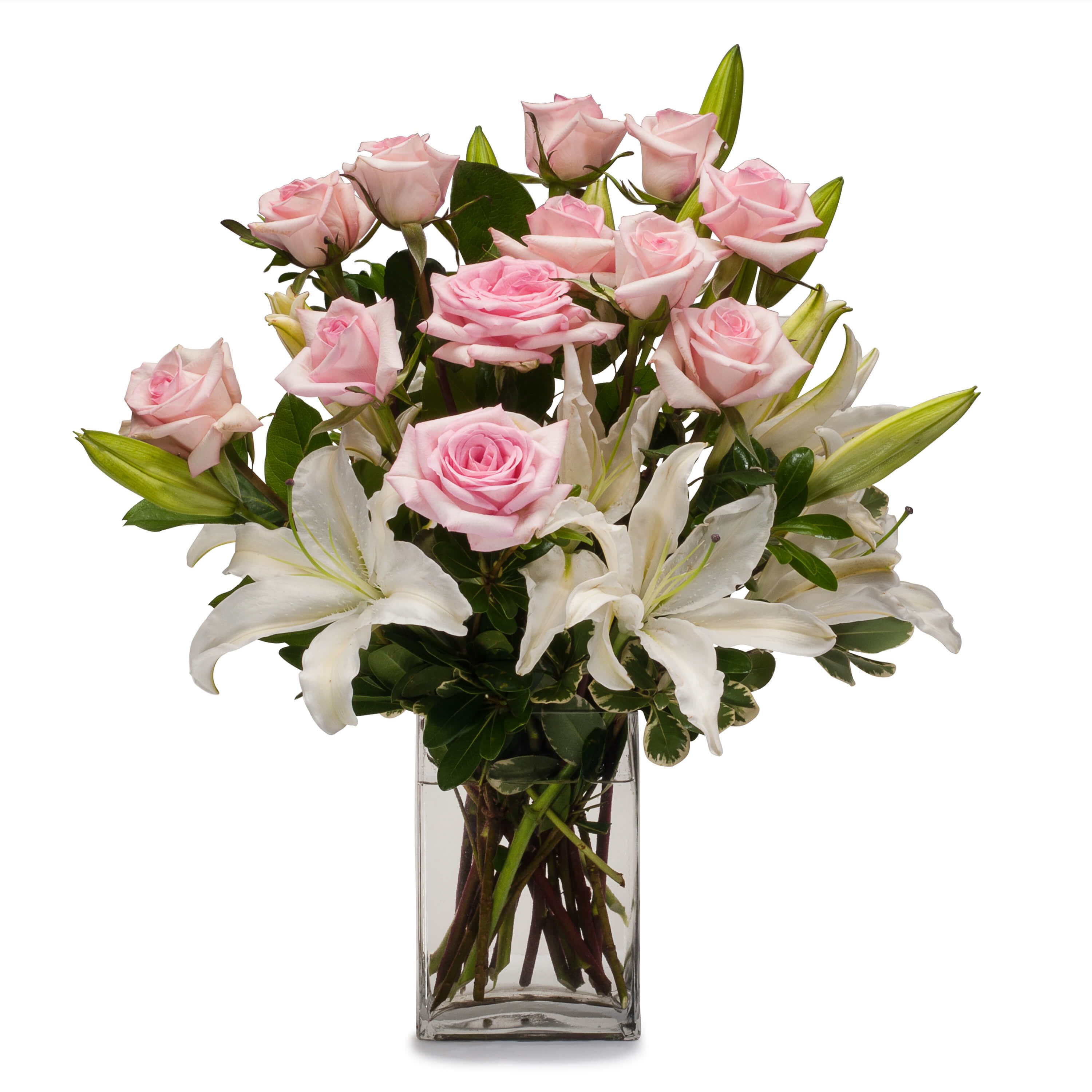 Kisses - This strikingly precious flower arrangement of white Lilies and pink Roses is an impeccable choice to celebrate pure joy and love. Roses and Lilies are not too subtle and have a genuine feeling of affection built into them.