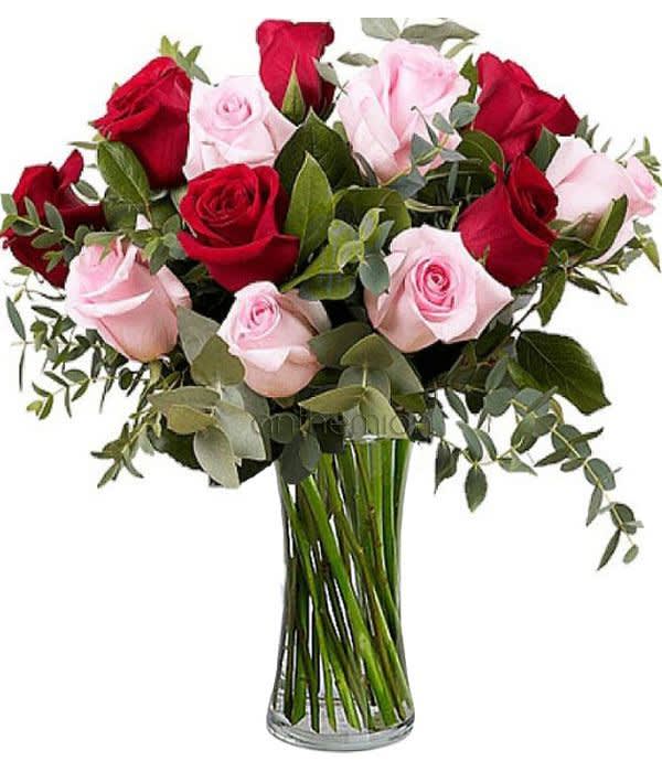 Pink and red roses in bouquet - Bouquet of 6 pink and 6 red roses surrounded by lush greenery. Your sweetheart will adore this beautiful bouquet and will bring joy with its exquisite beauty. It's a lovely way to send your love, say thank you, or even to extend your happy birthday wishes to your loved ones