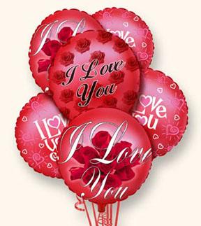 Cluster of red heart-shaped balloons with love messages