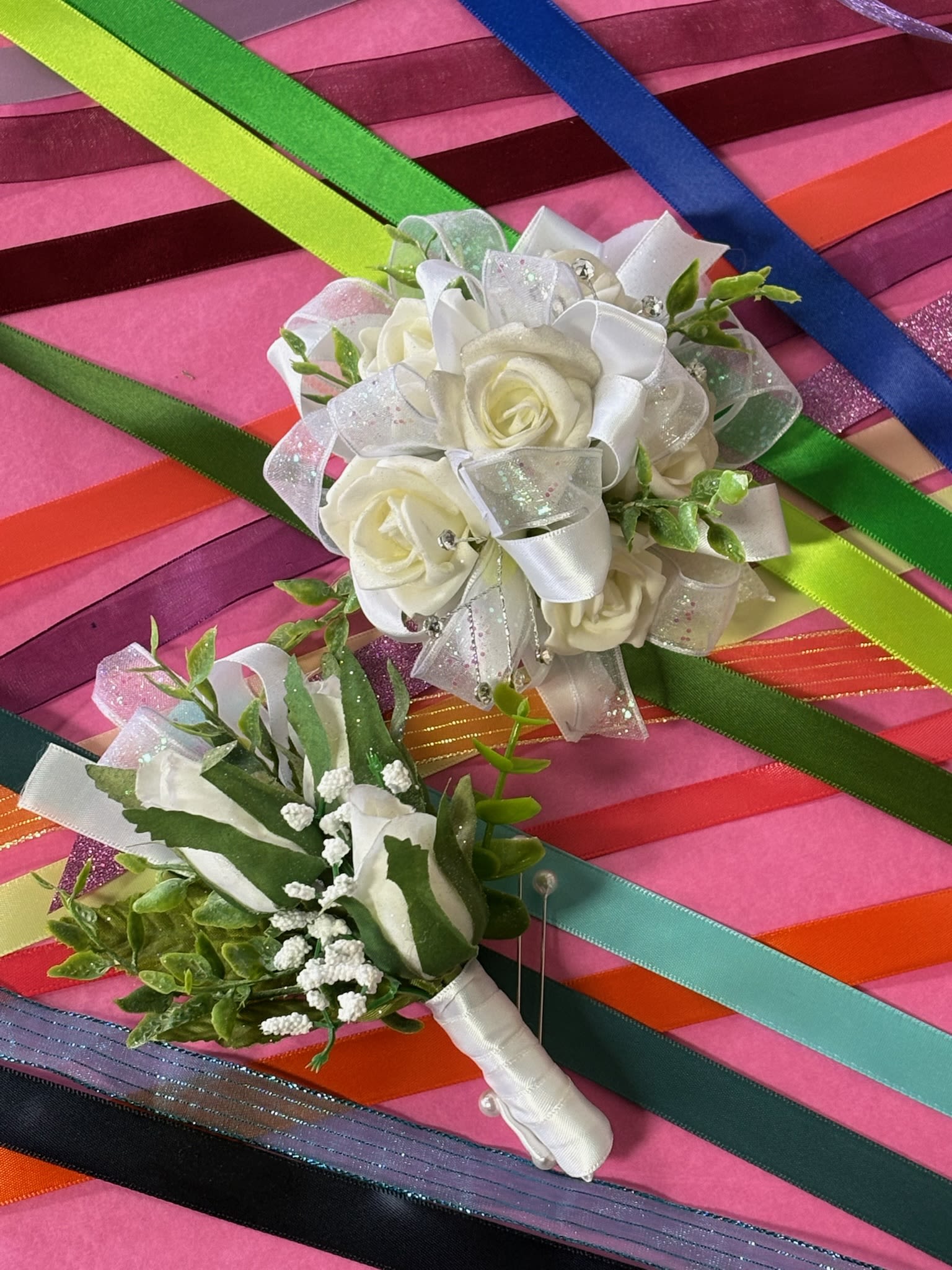 Prom Corsage and Boutonniere  Provide Color in the Special Instruction - The corsage/Boutonniere is made with spray roses.  Each will be made with the colors you specify. 