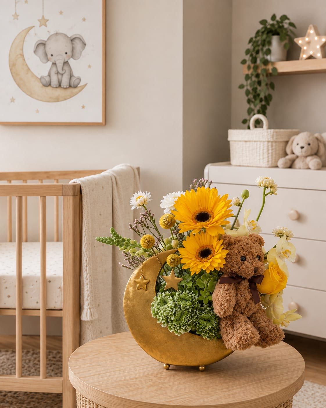 Yellow gerbera bouquet in a gold crescent vase with a teddy bear