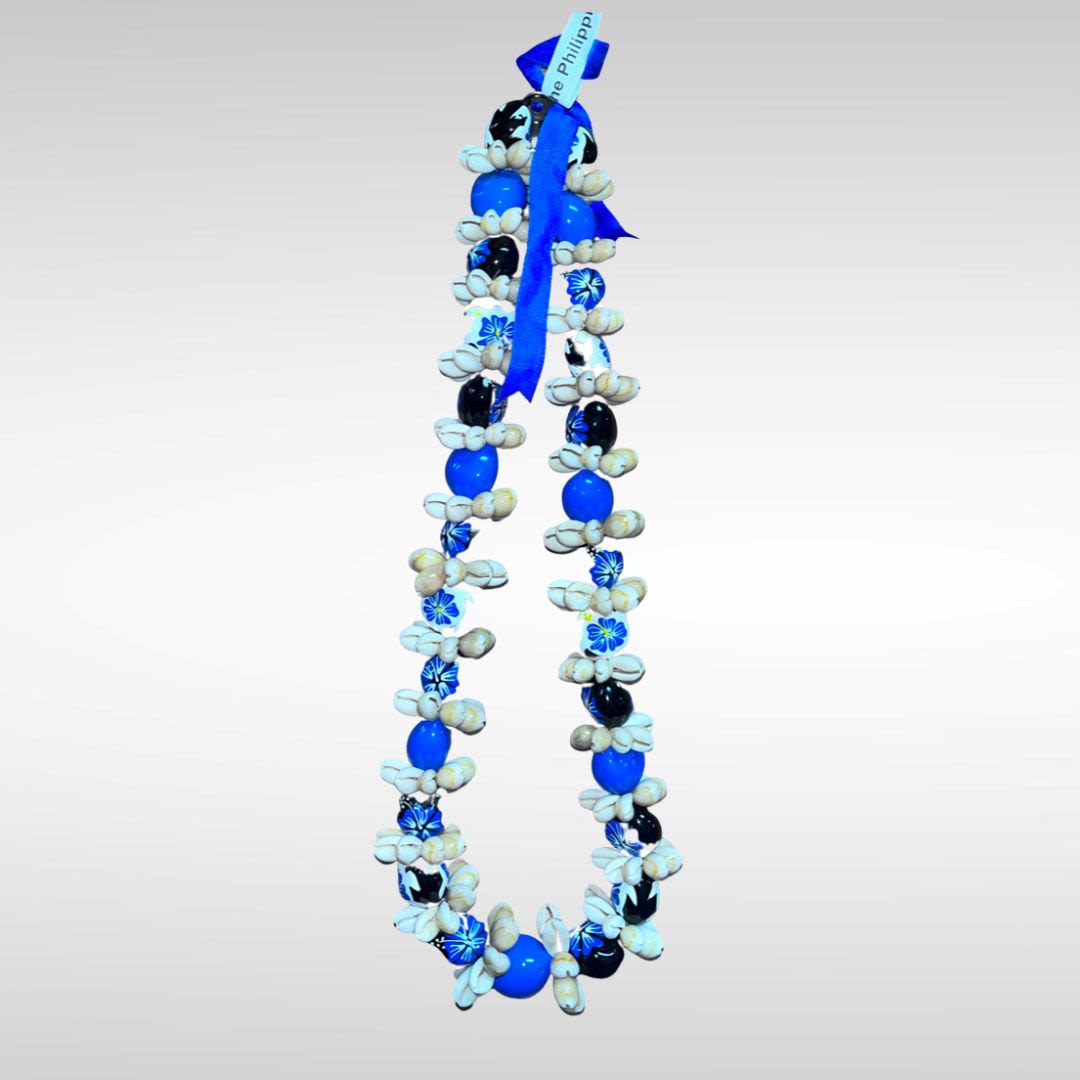 Blue and white shell lei with ribbon