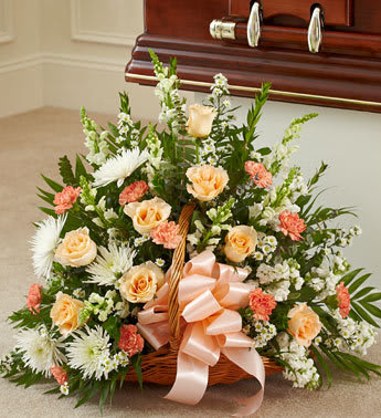 Thoughts and Prayer Fireside Basket peach - Product ID: 91203   This touching tribute beautifully conveys your sympathy and support. Peach roses, white mums, orange carnations, and more are arranged by our expert floral designers Traditionally sent by family, friends or business associates Delivered directly to the funeral home Our florists use only the freshest flowers available so varieties and colors may vary Measures approximately 26âH x 30âL