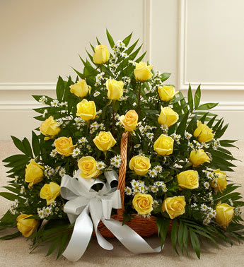 Sincerest Sympathies Fireside Basket - Yellow - This touching tribute beautifully and tastefully expresses your sympathy and support. Long stem yellow roses, white Monte Casino, and more are arranged in a fireside basket by our expert floral designers. FLOOR BASKET UNAVAILABLE. Will sub for similar. Please order 2-3 days in advance.