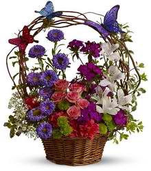 Dancing Butterflies   - How can you show how much you care ? With a basketful of butterflies and blooms! And while the pretty faux butterflies don't really dance, this whimsical basket can make anyone's heart leap with happiness. A splendid choice.   Approx. 14" W x 16" H