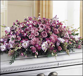 Large pink and purple floral casket spray