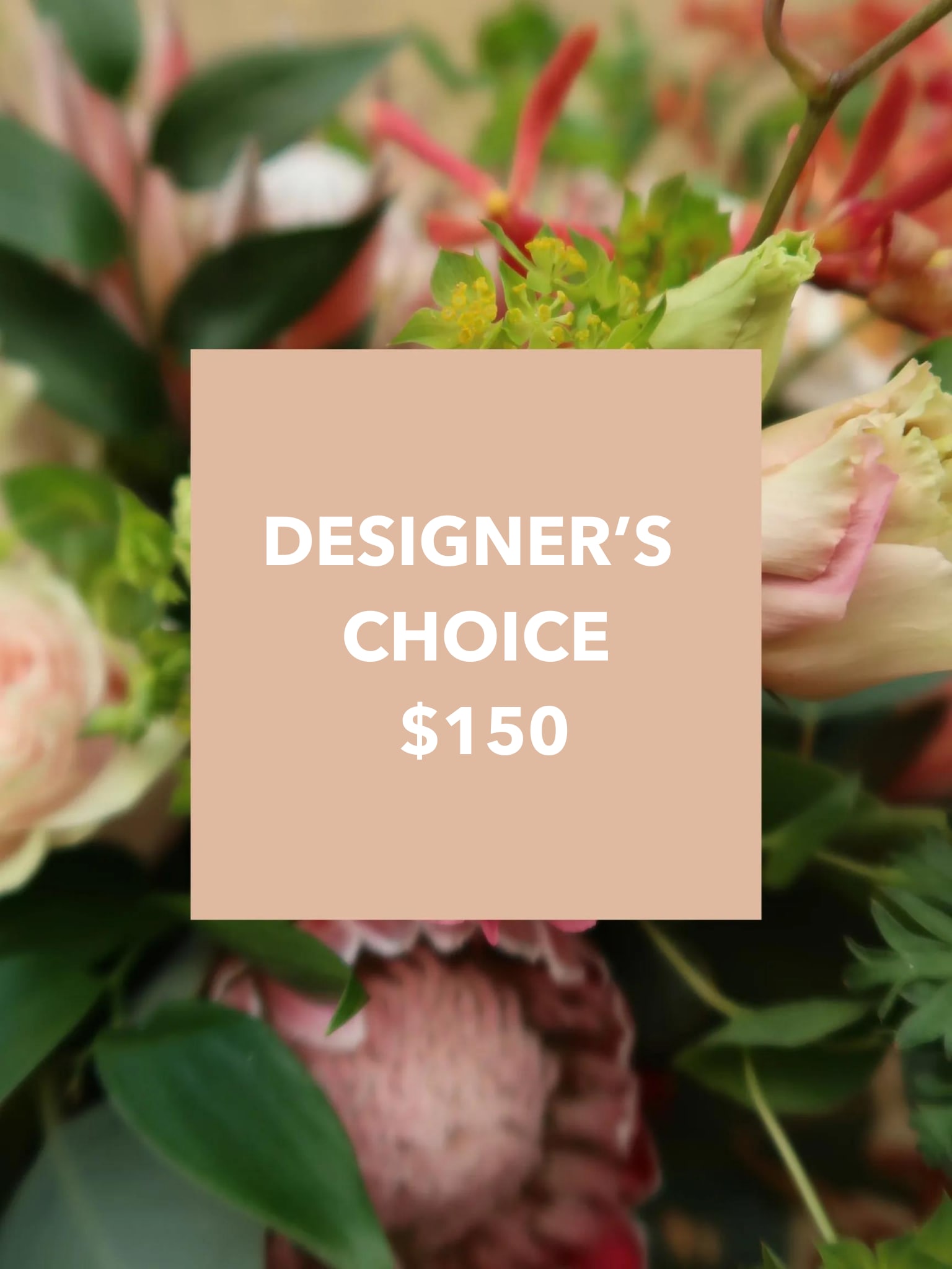 Designer’s choice floral arrangement with pink and cream blooms
