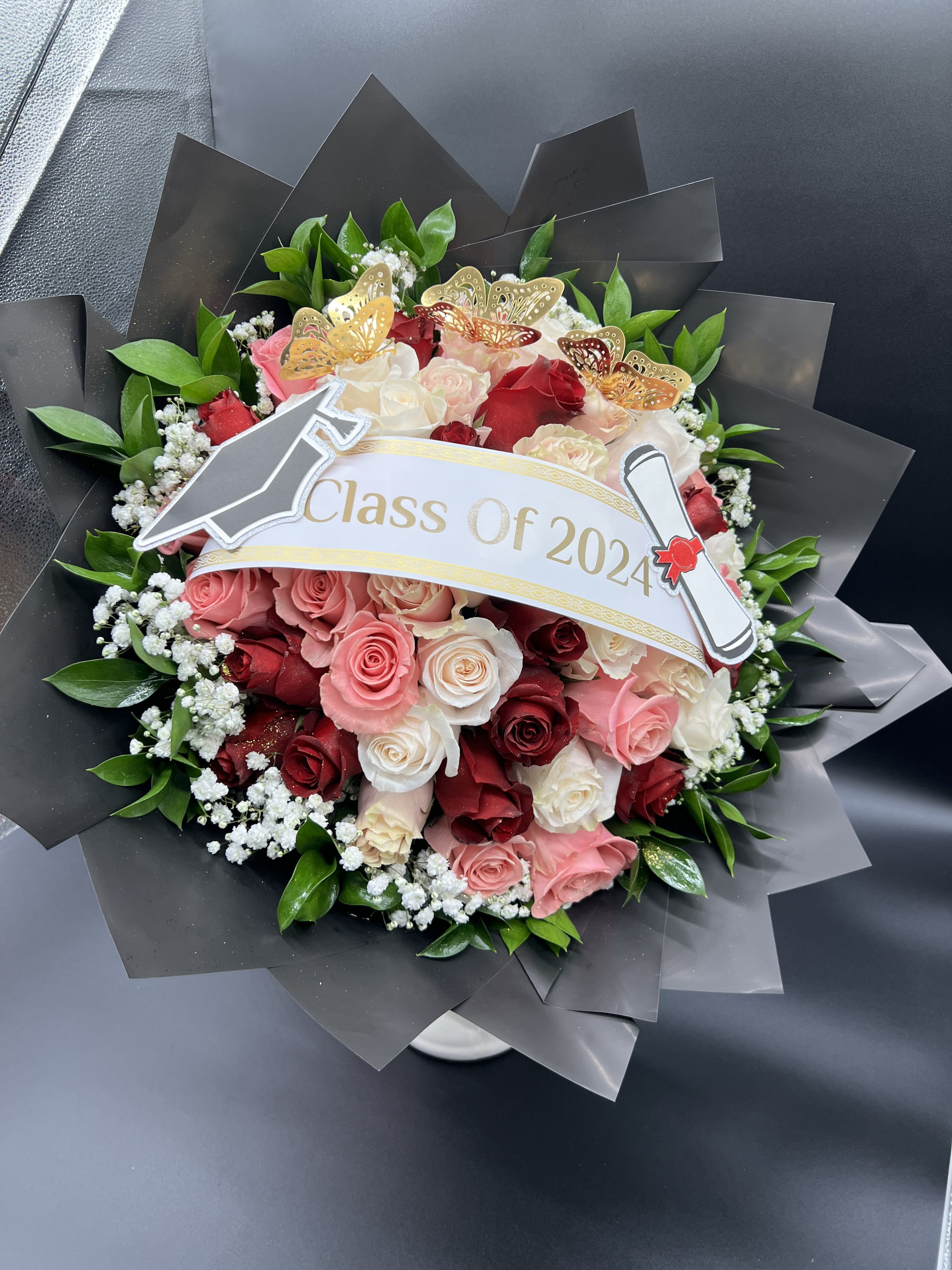 Graduation - 50 ROSES  75 ROSES  100 ROSES  Banner $10 Toppers $5 each