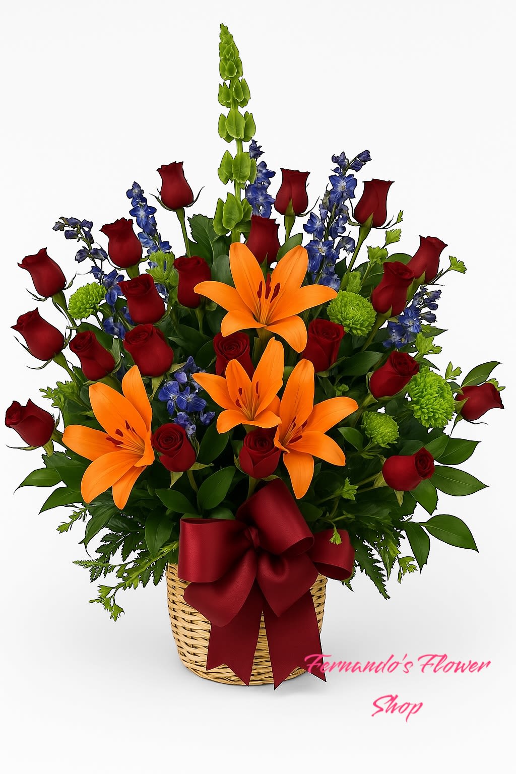 Basket arrangement of orange lilies, red roses, blue delphinium and green blooms with a red bow