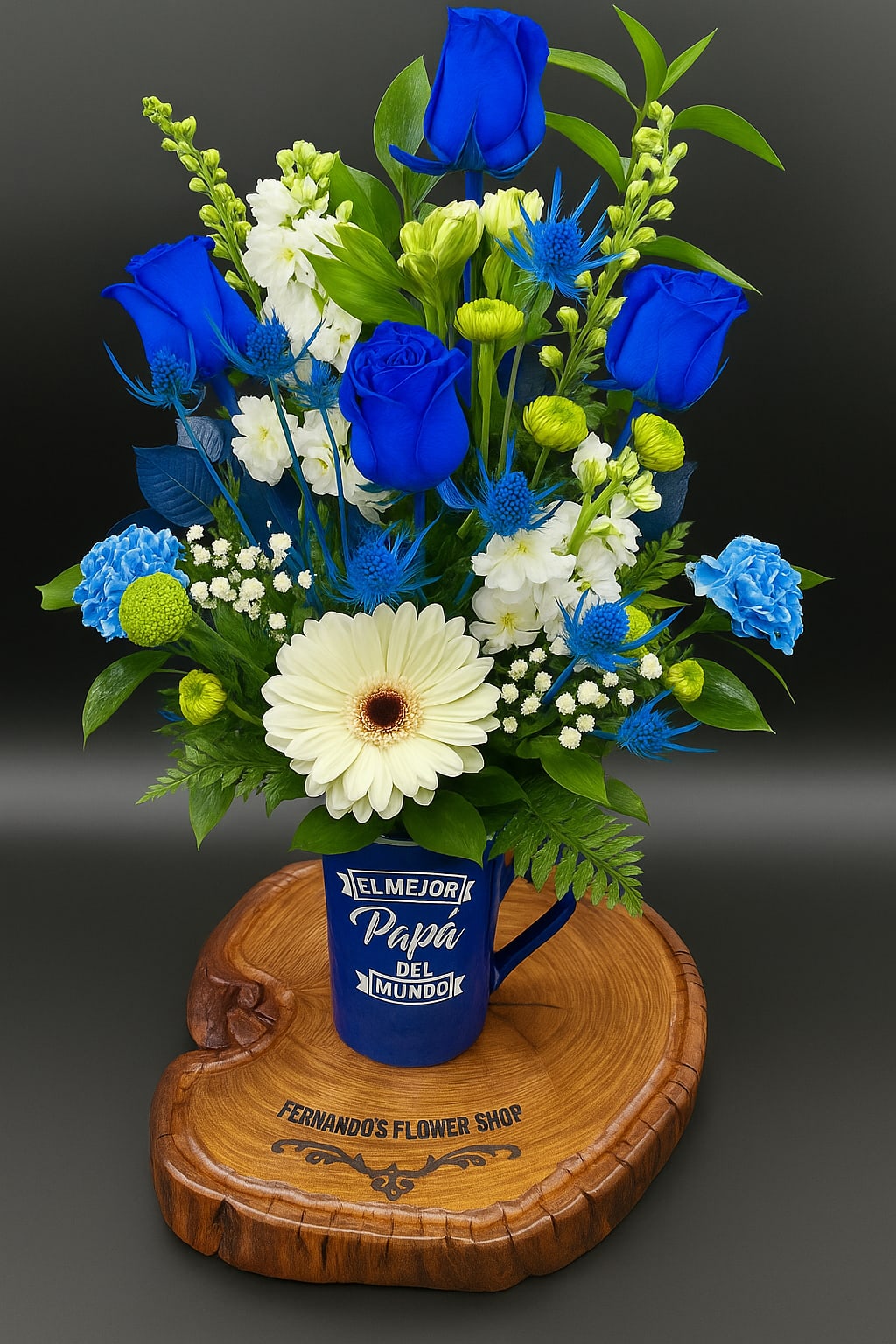 Blue and white mixed flower arrangement in a blue best dad mug on a wooden base