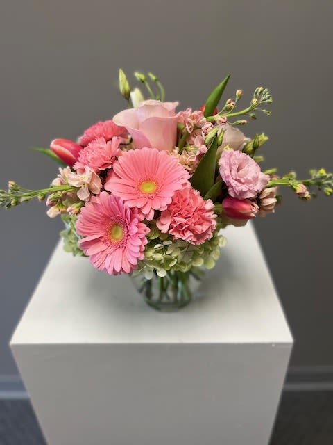 Pink mixed bouquet in a clear glass vase