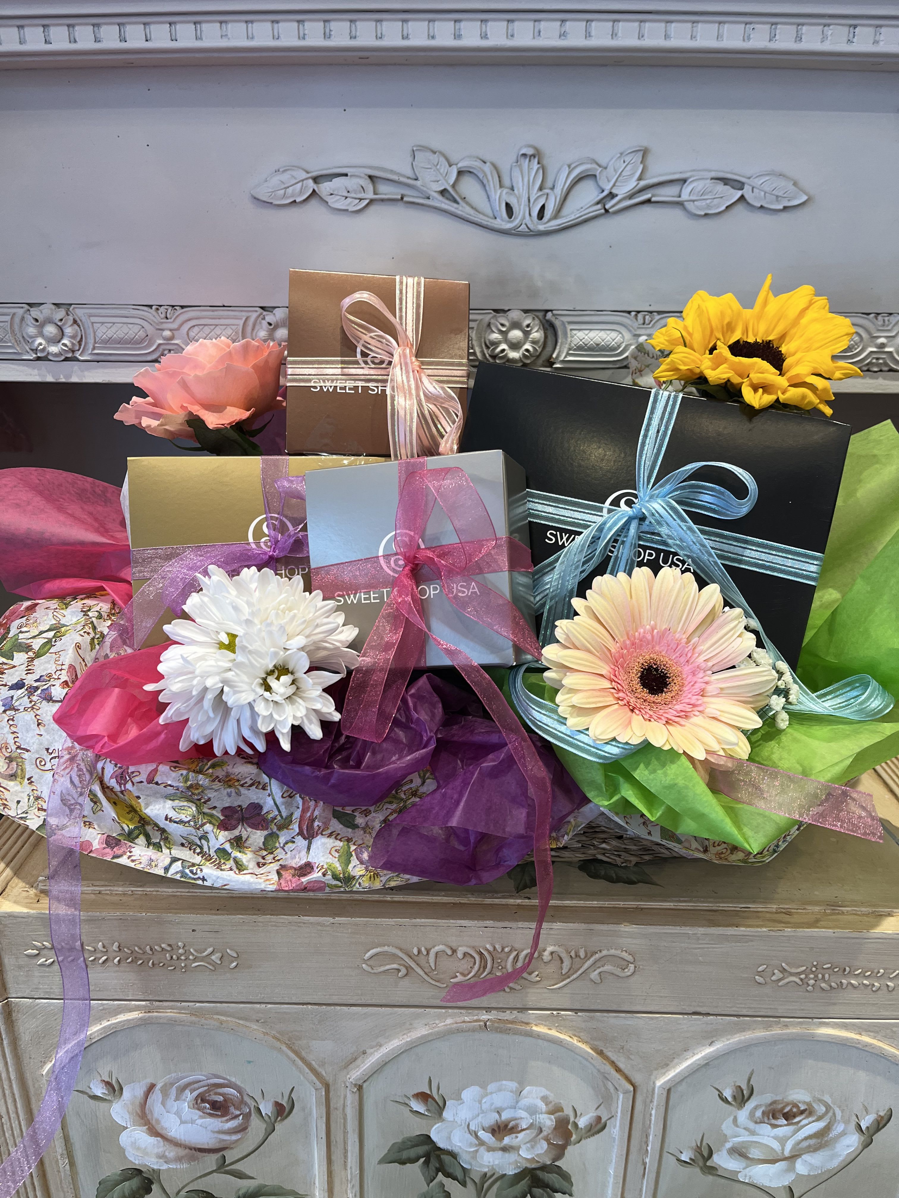 Truffle Treasure Basket - A beautiful, decorated gift basket filled with boxes of assorted Truffles
