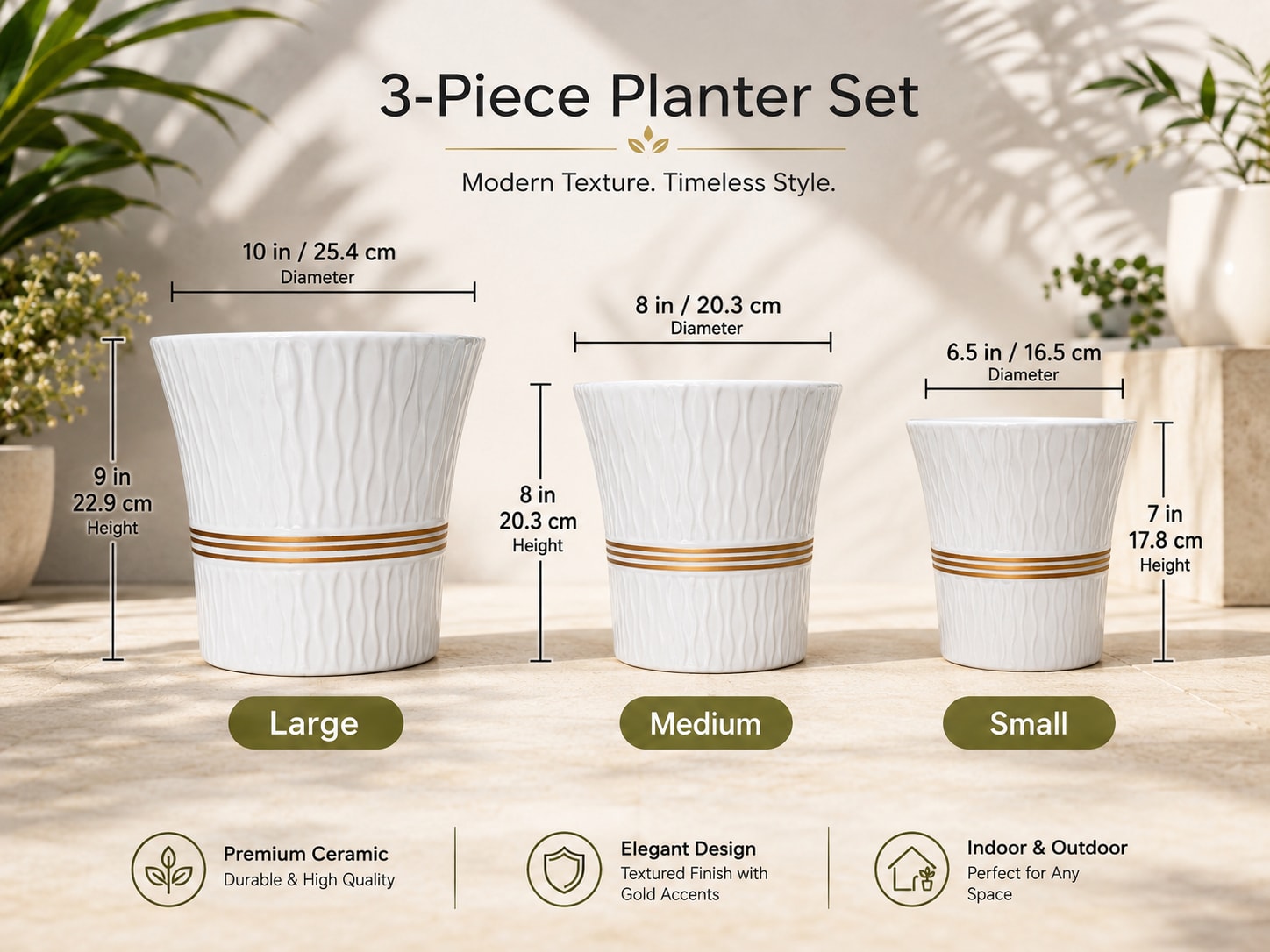 Three white textured ceramic planters in different sizes with gold bands.