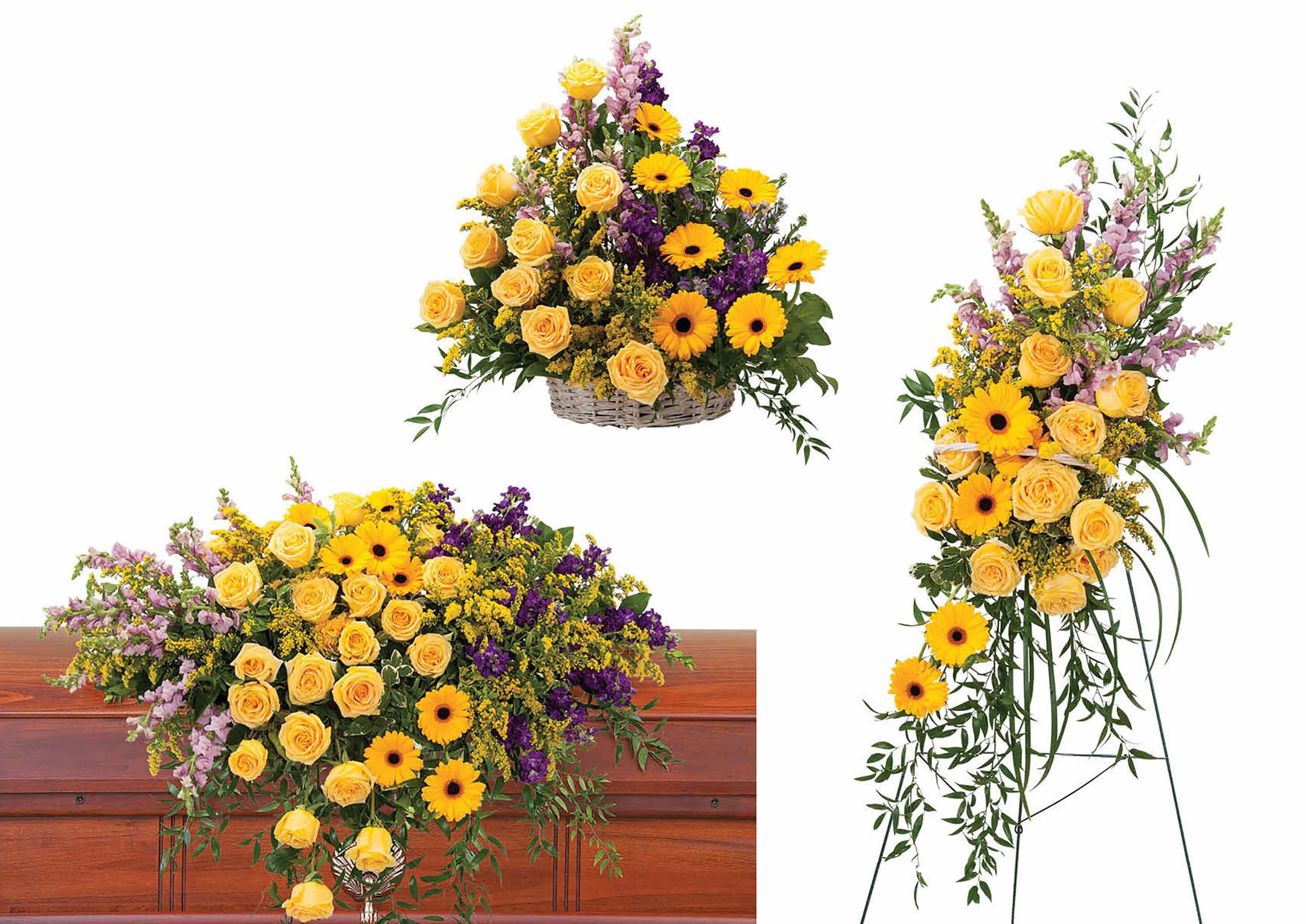 Set of yellow rose and daisy funeral arrangements with casket spray, basket, and standing spray.