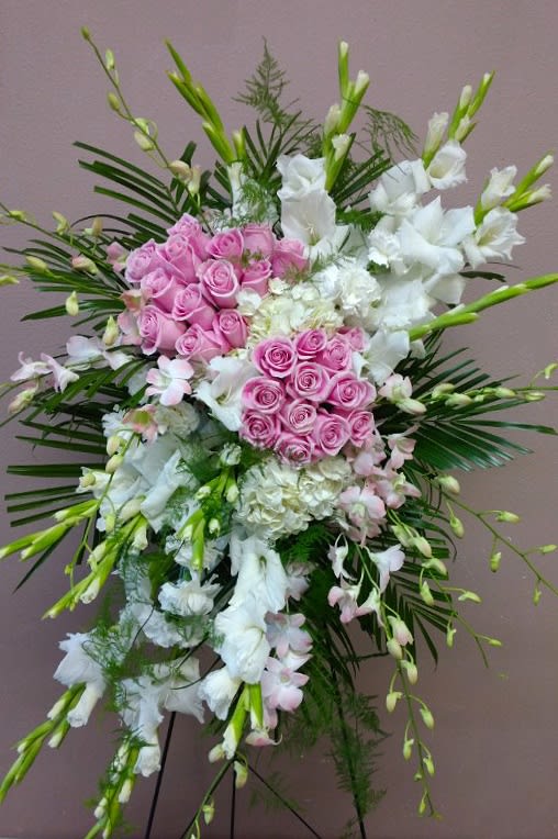 Standing floral spray with pink roses and white flowers