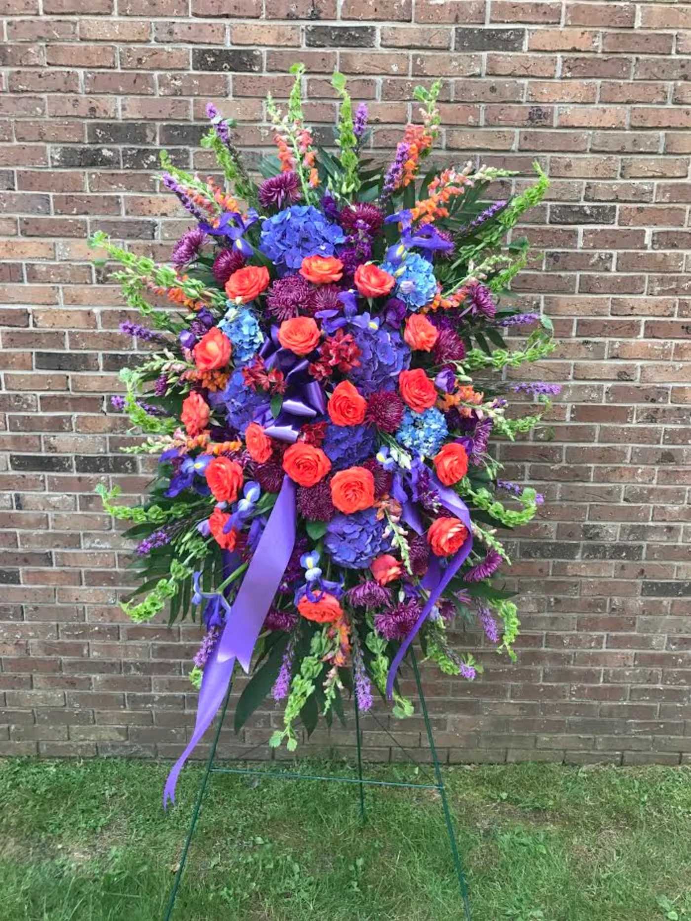 Sympathy Spray - A beautiful sentiment to express your condolences. Please request color combination of your choice in the special instruction field. We will try our best to honor your request of color.