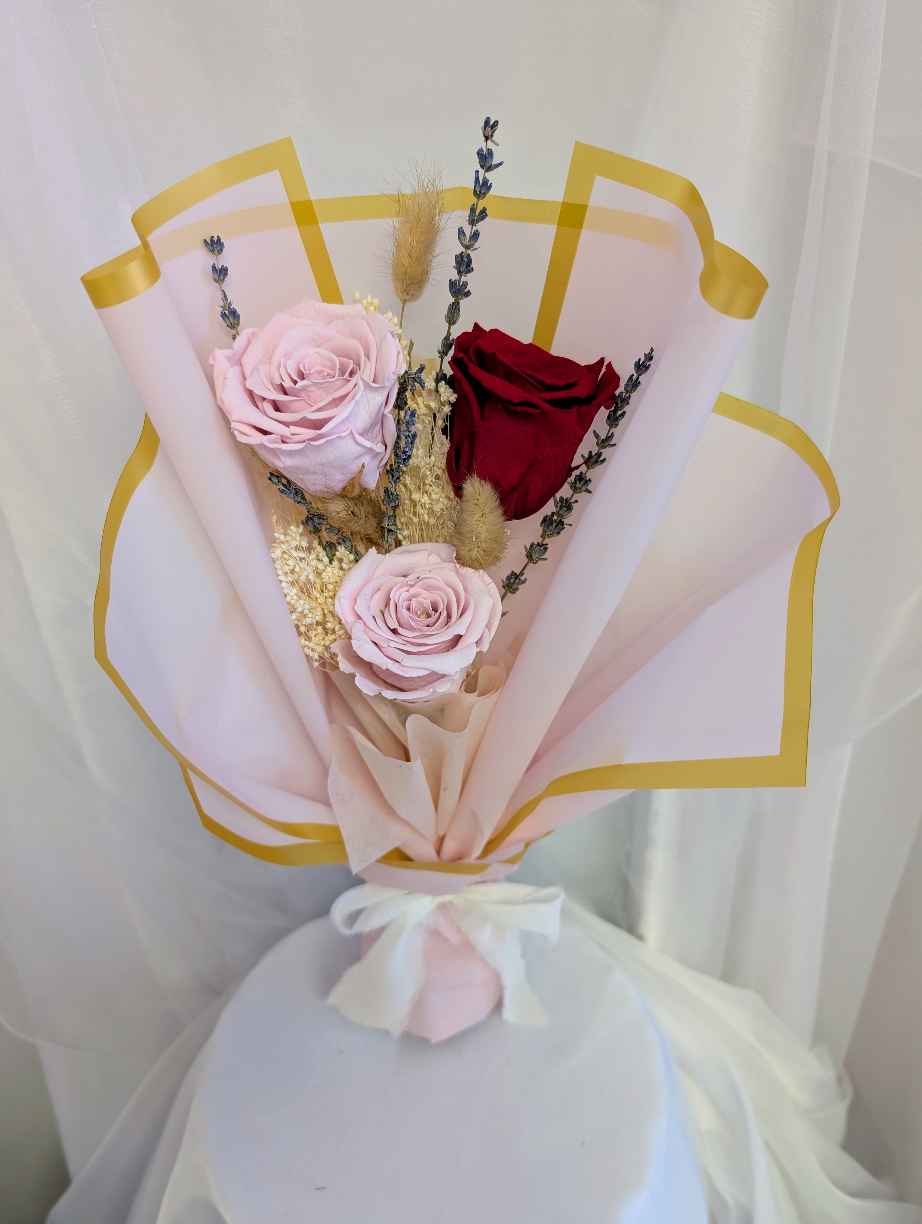 Blushing Love Bouquet - Forever roses complimented by preserved fillers and dried lavender arranged in a hand bouquet.