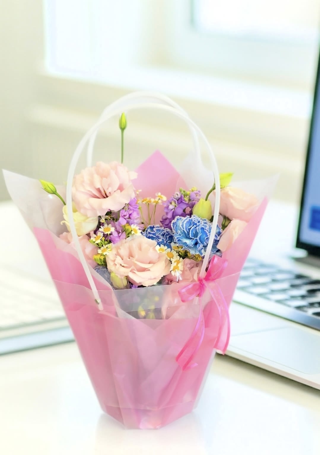A Bloomingful Gift - This bouquet will come with water source strapped in tissue paper and color wrap and placed in s clear waterproof gift bag.  Perfect for a quick gift  or to the office.  