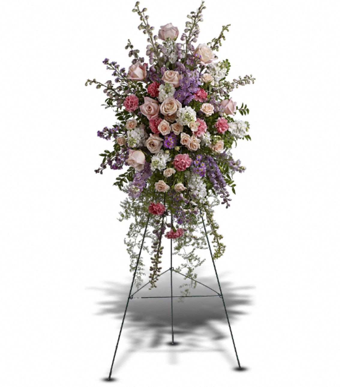 Tall pink and lavender standing floral spray on a metal easel