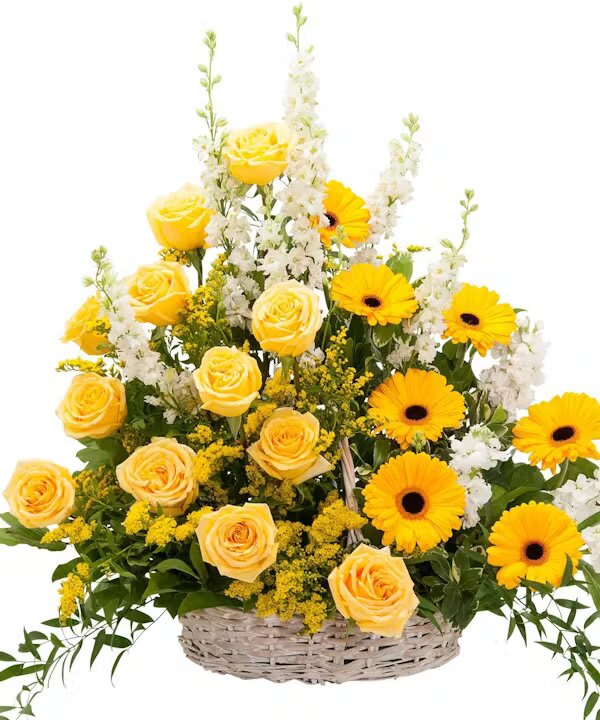 RAY OF SUNSHINE BASKET TRIBUTE - A white wicker basket filled with a beautiful selection of yellow flowers and foliage.  
