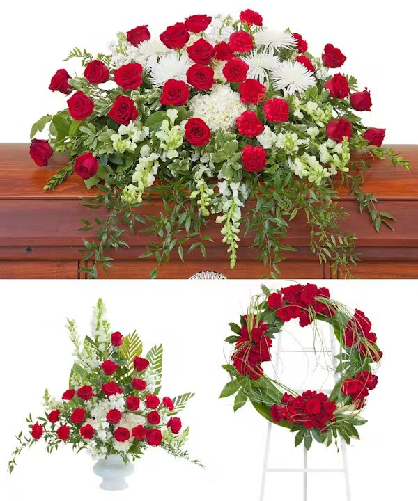 ENDURING STRENGTH TRIO - Red and white casket spray, urn, and wreath.  The Enduring Strength Trio from Morningside Florist in Sacramento is a profoundly touching and dignified way to convey sympathy and respect during loss. This trio of arrangements—featuring a casket spray, a standing wreath, and an elegant vase arrangement—creates a cohesive and striking tribute that celebrates life with honor and beauty.  Crafted with deep red roses, which symbolize love and grief, and complemented by pristine white blooms signifying purity and reverence, the arrangements come together to represent enduring strength and the everlasting nature of memories. The vivid contrast of red against white not only catches the eye but also touches the heart, embodying the passion of love and the solemnity of farewell. Choosing the Enduring Strength Trio from Morningside Florist is a thoughtful testament to the bond shared with the departed. It is a powerful way to express your support and share in mourning, providing a sense of solidarity and comfort to those who grieve. Morningside Florist’s dedication to delivering arrangements that encapsulate the depth of emotion and meticulous care ensures this final farewell is as beautiful and profound as the life being honored.