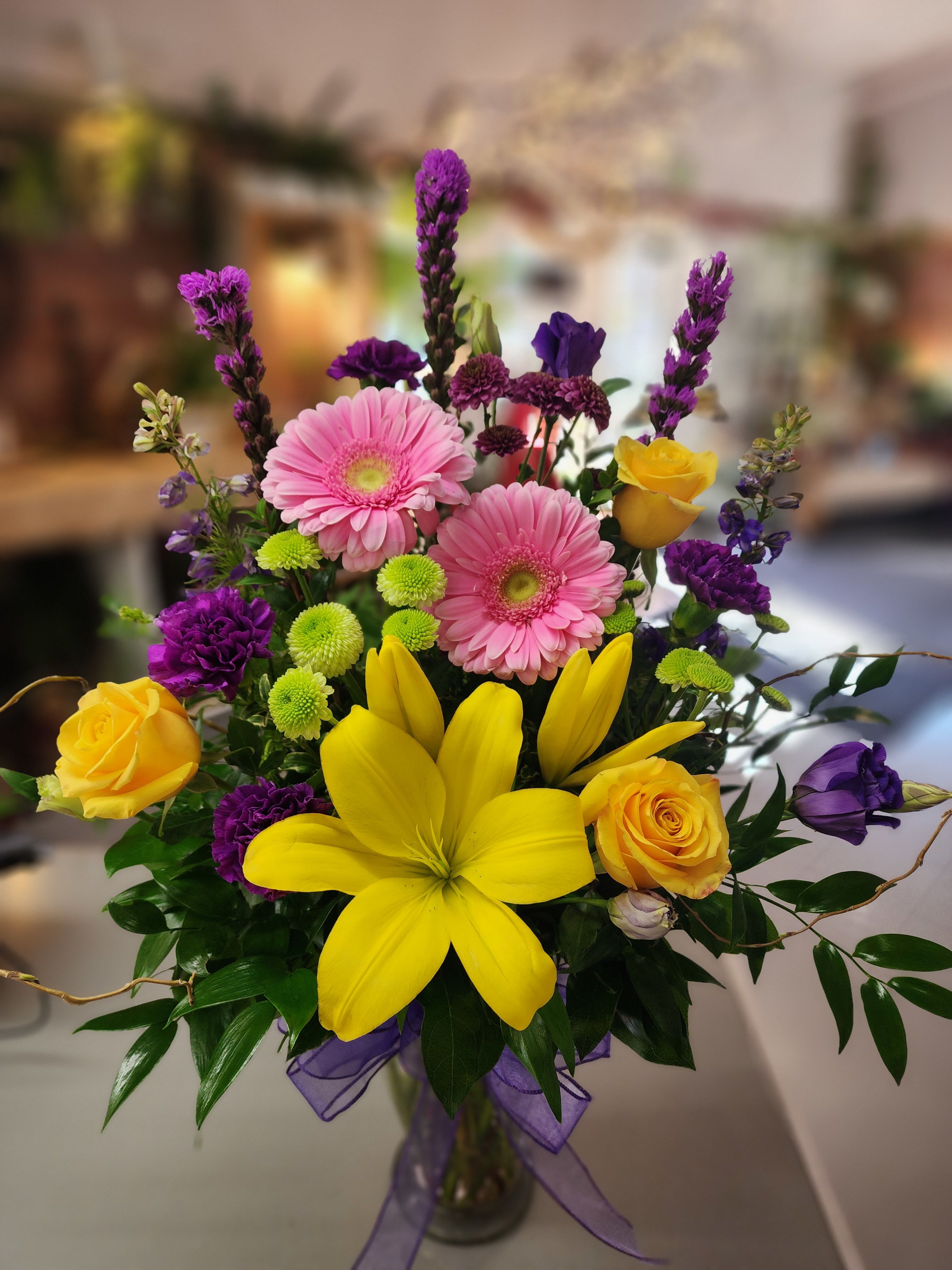 Spring Sunshine - Spring sunshine feels like a soft, golden embrace—warm but not overwhelming, gentle yet full of life. There's a freshness in its glow, a crisp brightness that lifts the world up, making everything feel renewed. Lovely lavenders /Purples embrace the vibrant yellows and soft pinks making this an amazing gift for any mom, grandma, friend or Wife.  