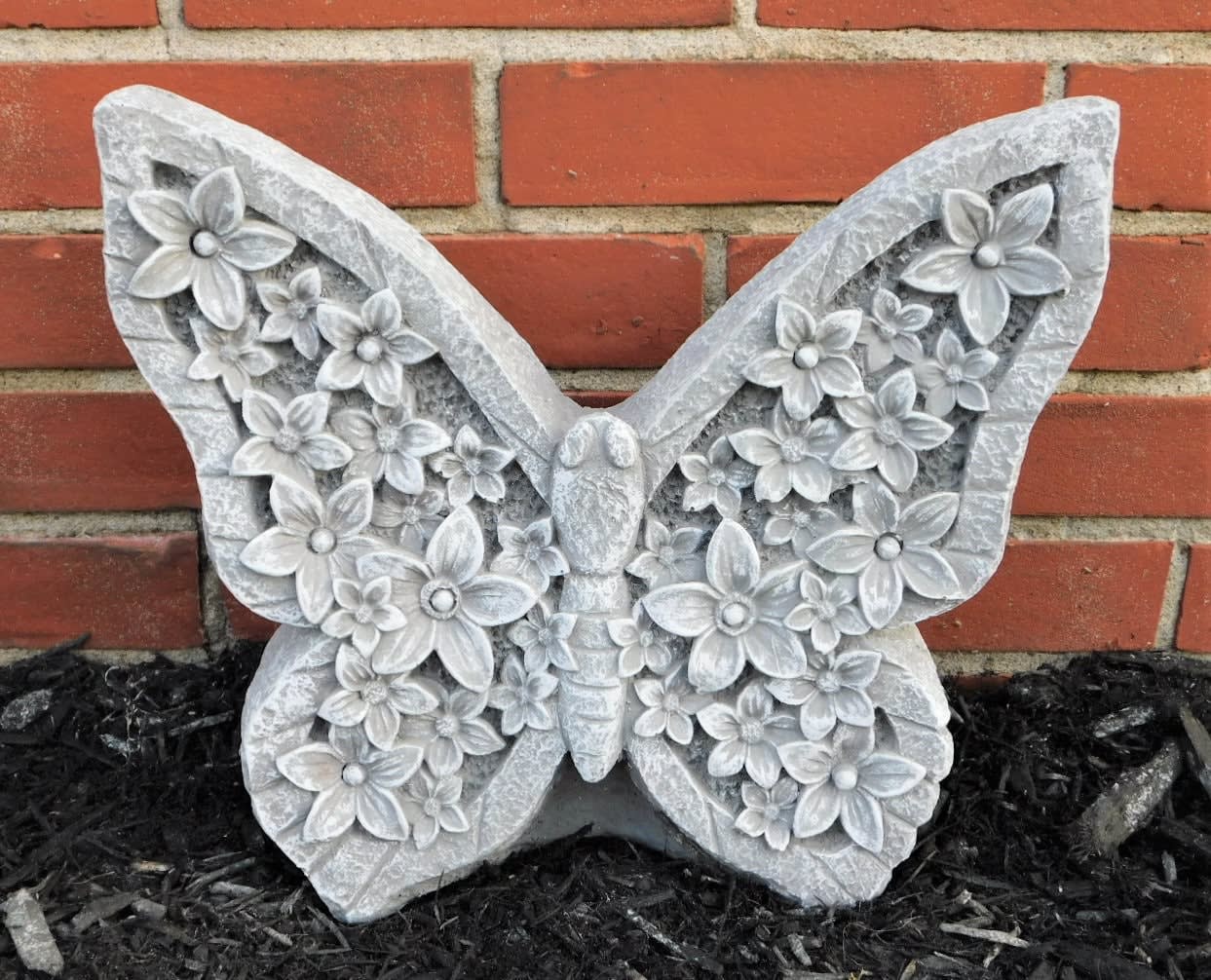 Statue and Stones Butterfly cement - Cement Butterfly  Please note pictures are a representation of product. Actual product will vary based on season and availability. 