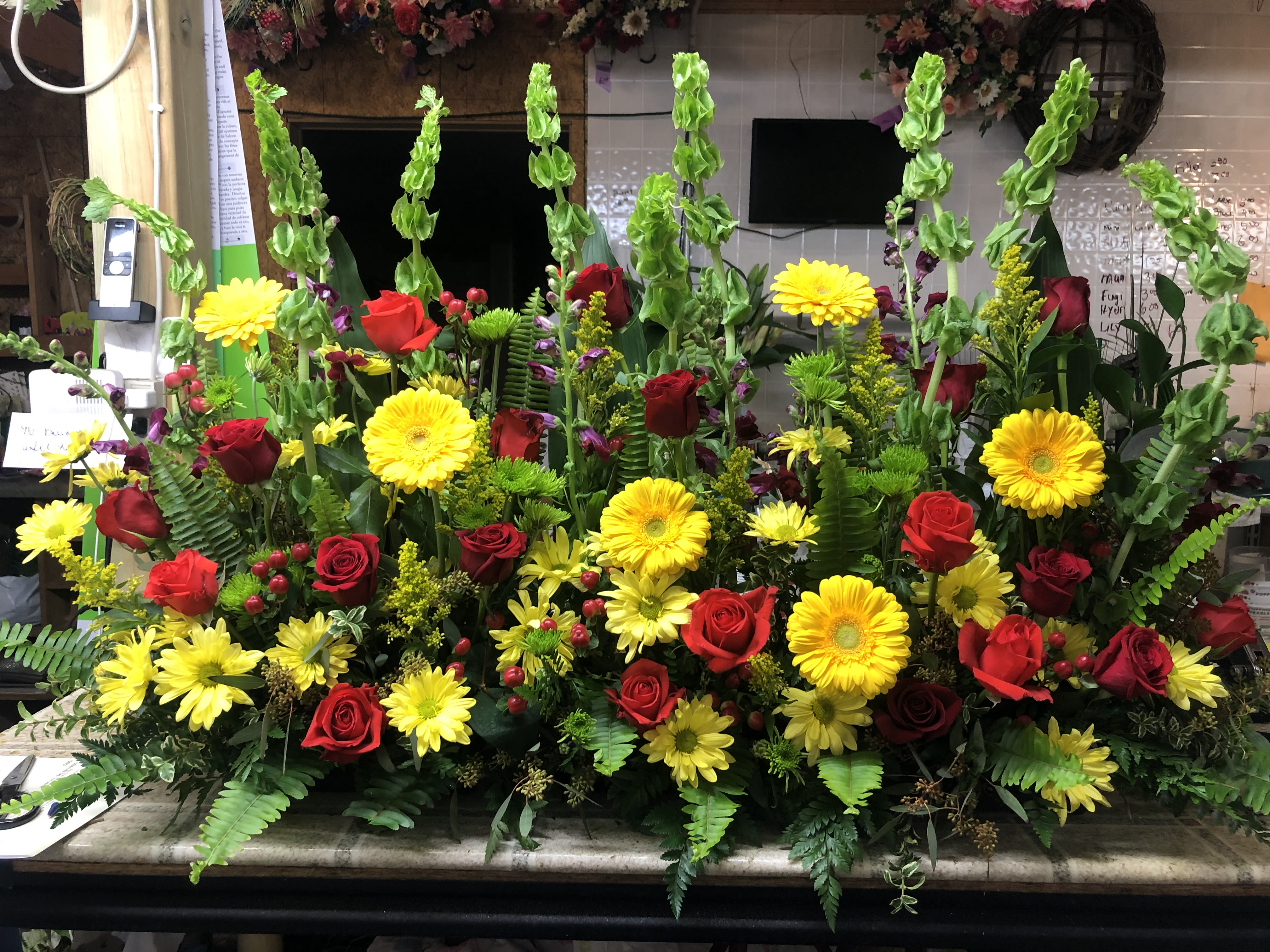 BURNING MEMORIES - A fiery funeral arrangement meant to keep the burning memories of passed loved ones alive and blooming